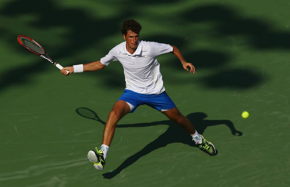 L&#39;olandese Robin Haase impegnato nel match contro l&#39;australiano Lleyton Hewit (Afp)